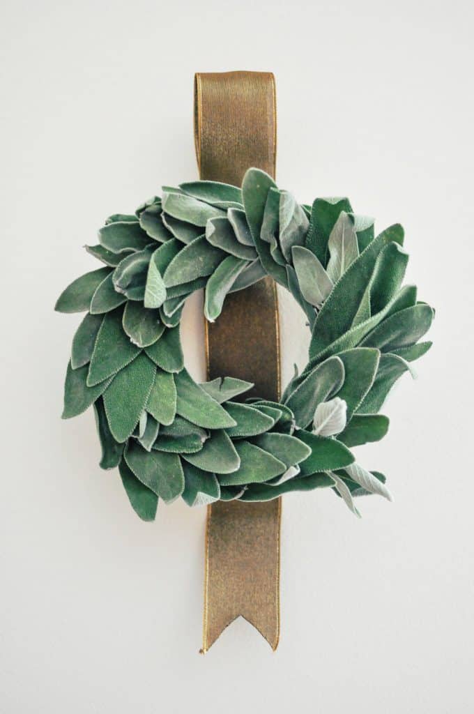 a beautiful christmas wreath made from fresh sage leaves